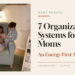 Organized mom working on a laptop in a calm home office with family schedules and storage systems.