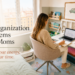 Organized mom working on a laptop in a calm home office with family schedules and storage systems.