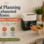 Woman placing a glass air fryer tray into a CREATE air fryer in a cozy kitchen while meal planning for family dinners