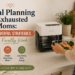 Woman placing a glass air fryer tray into a CREATE air fryer in a cozy kitchen while meal planning for family dinners