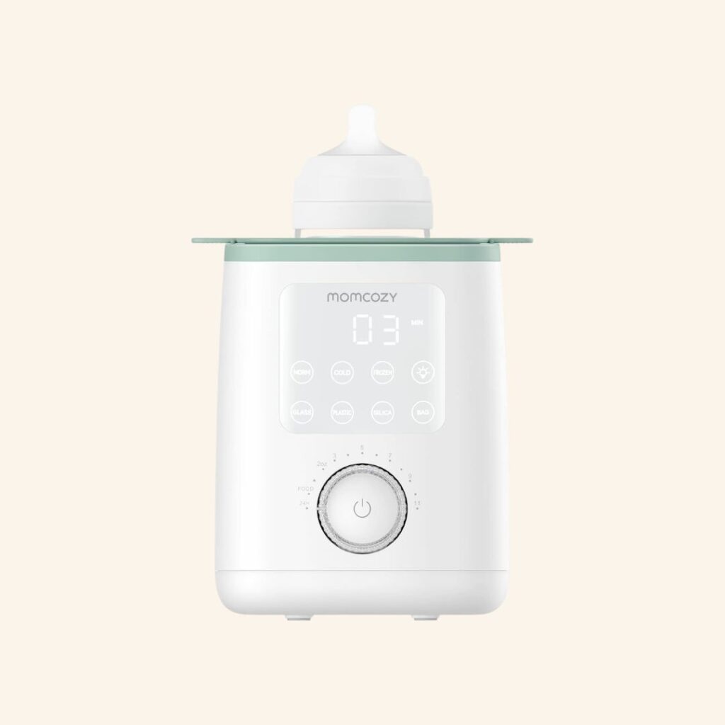 Momcozy bottle warmer with precise temperature control for breast milk and formula.